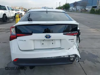 2021 Toyota Prius L Eco z VIN JTDKAMFU9M3131228, wystawiony jako IAAI lot #41257117 z przebiegiem 72 840 mil mil oraz . Historia ofert i sprzedaży dostępna na DreamBid. Obrazek 17.