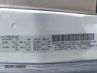 2015 Dodge Grand Caravan American Value with VIN 2C4RDGBG1FR748088, listed as a IAAI auction lot 42052160 with 248,540 mi miles and . Bid and sale history available at DreamBid. Image 9.