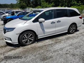 2023 Honda Odyssey Touring z VIN 5FNRL6H84PB071841, wystawiony jako Copart lot #56030675 z przebiegiem 24 615 mil mil oraz Szkoda całkowita • Salvage title. Historia ofert i sprzedaży dostępna na DreamBid. Obrazek 1.