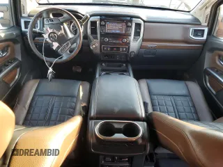 2016 Nissan Titan SL z VIN 1N6BA1F2XGN506885, wystawiony jako Copart lot #43457125 z przebiegiem 51 323 mil mil oraz Szkoda całkowita • Salvage title. Historia ofert i sprzedaży dostępna na DreamBid. Obrazek 8.