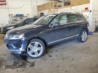 2015 Volkswagen Touareg Sport with VIN WVGEF9BP3FD003121, listed as a Copart auction lot 50572505 with 87,082 mi miles and Salvage title. Bid and sale history available at DreamBid. Image 1.