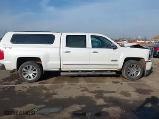 2017 Chevrolet Silverado 1500 High Country with VIN 3GCUKTEJ8HG172685, listed as a IAAI auction lot 41030890 with 113,688 mi miles. Bid and sale history available at carsss.com. Image 13.