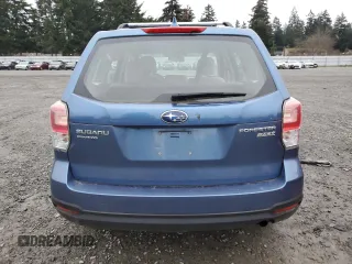 2017 Subaru Forester with VIN JF2SJAACXHG471100, listed as a Copart auction lot 81349614 with 82,864 mi miles and Salvage title. Bid and sale history available at DreamBid. Image 6.