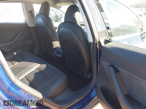 2018 Tesla Model 3 Long Range Battery with VIN 5YJ3E1EA0JF037736, listed as a IAAI auction lot 41423506 with 23,675 mi miles and . Bid and sale history available at DreamBid. Image 8.