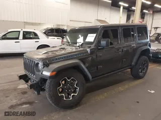 2022 Jeep Wrangler 4xe Unlimited Rubicon with VIN 1C4JJXR67NW229457, listed as a IAAI auction lot 41014010 with 53,075 mi miles. Bid and sale history available at carsss.com. Image 23.