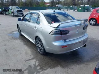 2017 Mitsubishi Lancer ES with VIN JA32V2FW9HU000485, listed as a IAAI auction lot 42019371 with 101,922 mi miles. Bid and sale history available at carsss.com. Image 3.