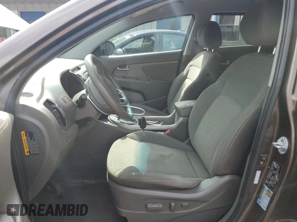 2012 Kia Sportage EX z VIN KNDPC3A29C7194059, wystawiony jako Copart lot #65810625 z przebiegiem 138 016 mil mil oraz Szkoda całkowita • Salvage title. Historia ofert i sprzedaży dostępna na DreamBid. Obrazek 7.