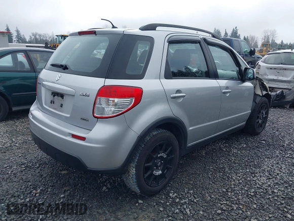 2010 Suzuki SX4 z VIN JS2YB5A3XA6300216, wystawiony jako IAAI lot #41869046 z przebiegiem 129 709 mil mil oraz . Historia ofert i sprzedaży dostępna na DreamBid. Obrazek 4.
