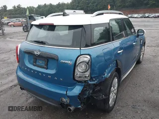 2019 MINI Countryman Cooper S with VIN WMZYT5C52K3G93902, listed as a IAAI auction lot 42650523 with 99,538 mi miles and . Bid and sale history available at DreamBid. Image 4.