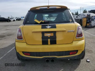 2009 MINI Hardtop S with VIN WMWMF73599TW87679, listed as a Copart auction lot 46863725 with 102,976 mi miles and Salvage title. Bid and sale history available at DreamBid. Image 6.