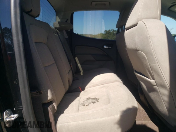 2015 GMC Canyon 2WD SLE with VIN 1GTG5BEA6F1221120, listed as a Copart auction lot 77391484 with 180,334 mi miles and Salvage Title. Bid and sale history available at carsss.com. Image 10.