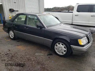 1995 Mercedes-Benz E Class with VIN WDBEB31E6SC142087, listed as a Copart auction lot 84019814 with 231,961 mi miles and Salvage Title. Bid and sale history available at carsss.com. Image 4.