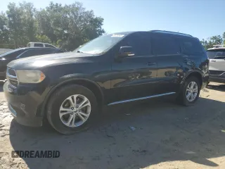 2012 Dodge Durango Crew z VIN 1C4RDHDG5CC275528, wystawiony jako Copart lot #66280965 z przebiegiem 213 851 mil mil oraz Czysty tytuł • Clean title. Historia ofert i sprzedaży dostępna na DreamBid. Obrazek 1.
