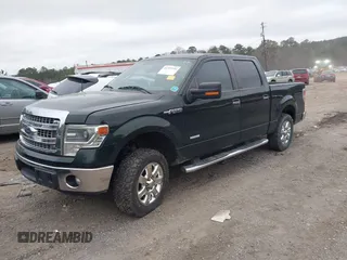 2014 Ford F-150 XL with VIN 1FTFW1CT9EKG41762, listed as a IAAI auction lot 41797534 with 218,089 mi miles. Bid and sale history available at carsss.com. Image 17.