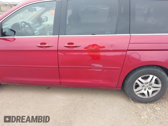 2006 Honda Odyssey EX-L with VIN 5FNRL38696B408404, listed as a IAAI auction lot 42081782 with 229,835 mi miles. Bid and sale history available at carsss.com. Image 12.