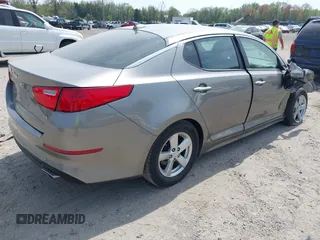 2015 Kia Optima LX z VIN 5XXGM4A76FG421945, wystawiony jako IAAI lot #42112703 z przebiegiem 106 050 mil mil oraz . Historia ofert i sprzedaży dostępna na DreamBid. Obrazek 4.