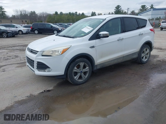 2016 Ford Escape SE with VIN 1FMCU9GX1GUA76589, listed as a IAAI auction lot 42014929 with 125,294 mi miles. Bid and sale history available at carsss.com. Image 2.