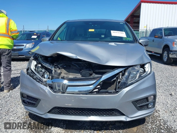 2018 Honda Odyssey EX-L with VIN 5FNRL6H75JB092633, listed as a IAAI auction lot 41971589 with 103,099 mi miles and . Bid and sale history available at DreamBid. Image 13.