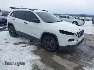 2016 Jeep Cherokee Altitude with VIN 1C4PJLAB4GW376723, listed as a IAAI auction lot 41593248 with 96,940 mi miles and . Bid and sale history available at DreamBid. Image 1.