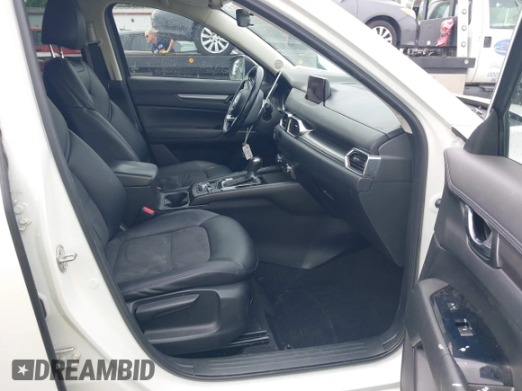 2018 Mazda CX-5 Touring with VIN JM3KFBCMXJ0366008, listed as a IAAI auction lot 42079989 with 153,868 mi miles and . Bid and sale history available at DreamBid. Image 5.