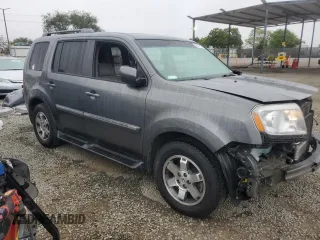 2011 Honda Pilot Touring z VIN 5FNYF4H94BB046303, wystawiony jako Copart lot #58017515 z przebiegiem 118 384 mil mil oraz Szkoda całkowita • Salvage title. Historia ofert i sprzedaży dostępna na DreamBid. Obrazek 4.