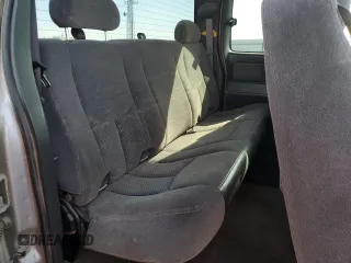 2005 Chevrolet Silverado 1500 LS z VIN 1GCEK19T55E193176, wystawiony jako Copart lot #52181185 z przebiegiem 418 180 mil mil oraz Czysty tytuł • Clean title. Historia ofert i sprzedaży dostępna na DreamBid. Obrazek 10.