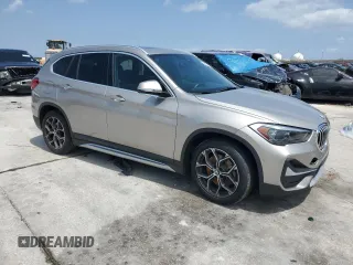 2021 BMW X1 sDrive28i with VIN WBXJG7C08M5S33866, listed as a Copart auction lot 54729715 with Not Provided miles and Salvage Title. Bid and sale history available at DreamBid. Image 4.