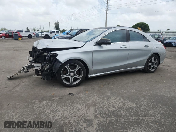 2014 Mercedes-Benz CLA 250 with VIN WDDSJ4EB8EN038969, listed as a Copart auction lot 62115635 with 101,368 mi miles and Salvage title. Bid and sale history available at DreamBid. Image 1.