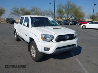 2015 Toyota Tacoma PreRunner z VIN 3TMJU4GN4FM189663, wystawiony jako IAAI lot #41488207 z przebiegiem 98 868 mil mil oraz . Historia ofert i sprzedaży dostępna na DreamBid. Obrazek 1.