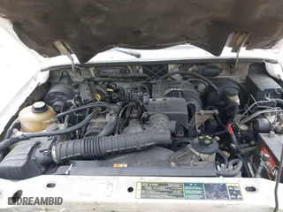 2003 Ford Ranger XL with VIN 1FTYR10D03TA39871, listed as a IAAI auction lot 42092257 with 282,924 mi miles. Bid and sale history available at carsss.com. Image 10.
