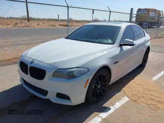 2013 BMW 5 Series 528i with VIN WBAXG5C56DD230121, listed as a IAAI auction lot 42019899 with 142,100 mi miles and . Bid and sale history available at carsss.com. Image 2.