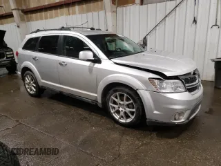 2013 Dodge Journey R/T with VIN 3C4PDDFG8DT621087, listed as a Copart auction lot 83105834 with 156,172 mi miles and Salvage title. Bid and sale history available at DreamBid. Image 4.