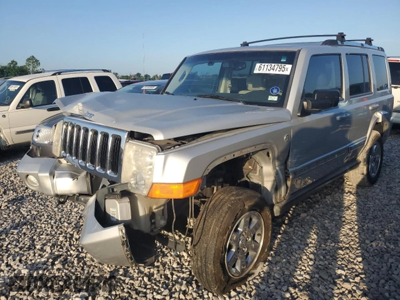 2006 Jeep Commander Limited z VIN 1J8HG58296C170388, wystawiony jako Copart lot #61134795 z przebiegiem 117 992 mil mil oraz Szkoda całkowita • Salvage title. Historia ofert i sprzedaży dostępna na DreamBid. Obrazek 1.