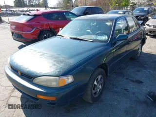 1996 Toyota Camry DX with VIN 4T1BG12K1TU688639, listed as a IAAI auction lot 41883160 with 264,542 mi miles. Bid and sale history available at carsss.com. Image 2.