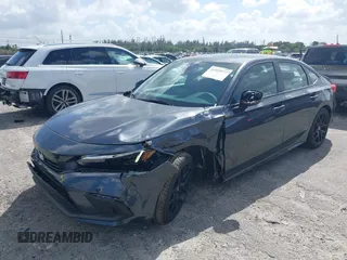 2024 Honda Civic Sedan Sport with VIN 2HGFE2F59RH594821, listed as a IAAI auction lot 41959977 with 11,271 mi miles. Bid and sale history available at carsss.com. Image 2.