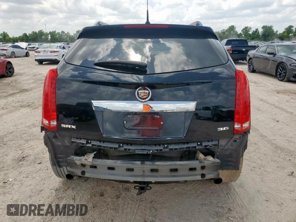 2013 Cadillac SRX Performance Collection with VIN 3GYFNDE31DS569809, listed as a Copart auction lot 60332445 with 222,167 mi miles and Salvage title. Bid and sale history available at DreamBid. Image 6.