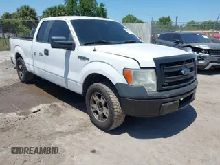 2014 Ford F-150 XL with VIN 1FTEX1CM4EFA59675, listed as a IAAI auction lot 42068873 with 205,342 mi miles. Bid and sale history available at carsss.com. Image 1.