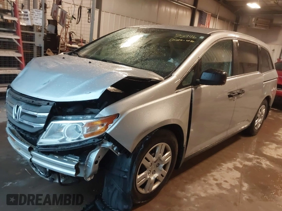 2012 Honda Odyssey LX with VIN 5FNRL5H27CB092988, listed as a IAAI auction lot 41933507 with 123,233 mi miles and . Bid and sale history available at DreamBid. Image 2.