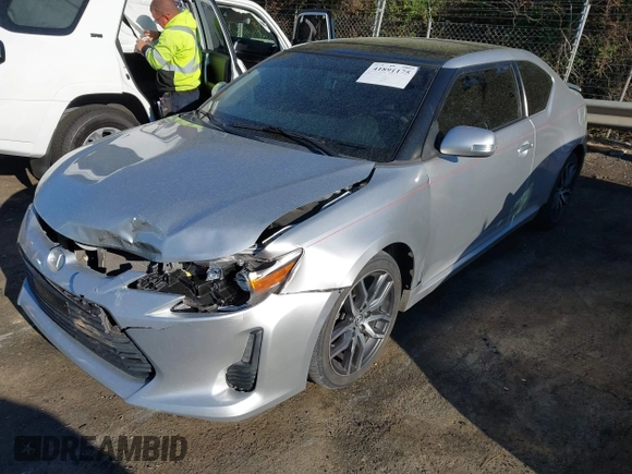 2014 Scion tC with VIN JTKJF5C74E3088669, listed as a IAAI auction lot 41891175 with 86,160 mi miles. Bid and sale history available at carsss.com. Image 17.