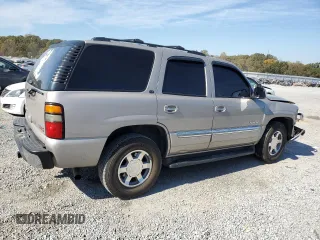 2006 GMC Yukon SLT with VIN 1GKEK13T96J110533, listed as a Copart auction lot 77797364 with 209,339 mi miles and Salvage Title. Bid and sale history available at carsss.com. Image 3.