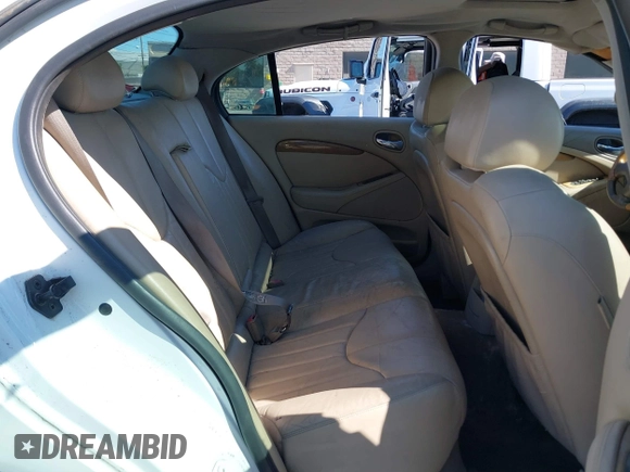 2000 Jaguar S-Type V8 with VIN SAJDA01D9YGL52238, listed as a IAAI auction lot 38743231 with Not Provided miles and . Bid and sale history available at DreamBid. Image 8.