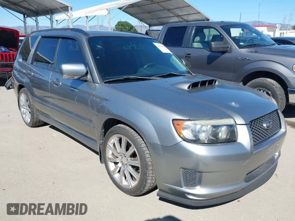 2007 Subaru Forester Sports XT with VIN JF1SG69687H733459, listed as a IAAI auction lot 41827464 with 139,943 mi miles. Bid and sale history available at carsss.com. Image 1.