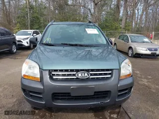 2007 Kia Sportage LX with VIN KNDJF724877403320, listed as a IAAI auction lot 41704797 with 330,684 mi miles. Bid and sale history available at carsss.com. Image 12.