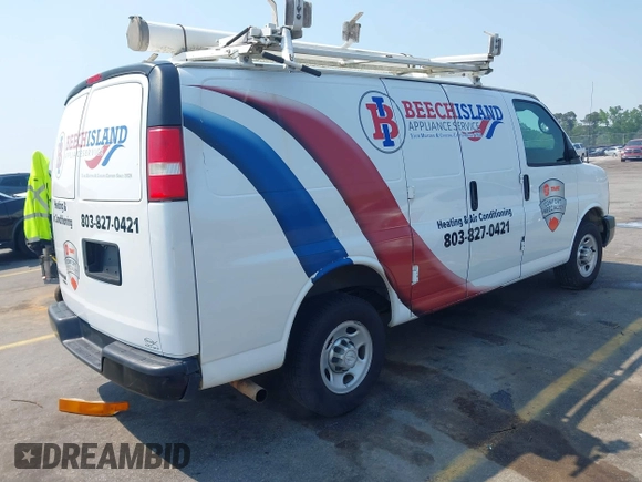2015 Chevrolet Express Cargo Van with VIN 1GCWGFCF8F1255703, listed as a IAAI auction lot 41995763 with 215,212 mi miles. Bid and sale history available at carsss.com. Image 4.