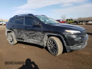 2014 Jeep Cherokee Altitude with VIN 1C4PJMCS0EW291247, listed as a Copart auction lot 47694115 with 124,775 mi miles and Salvage Title. Bid and sale history available at carsss.com. Image 4.