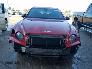 2023 Bentley Bentayga z VIN SJAAT2ZV8PC021680, wystawiony jako Copart lot #39350374 z przebiegiem 2441 mil mil oraz . Historia ofert i sprzedaży dostępna na DreamBid. Obrazek 5.