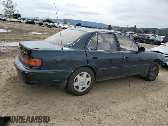 1994 Toyota Camry LE z VIN JT2GK12E2R0039606, wystawiony jako Copart lot #49840015 z przebiegiem 197 834 mil mil oraz Szkoda całkowita • Salvage title. Historia ofert i sprzedaży dostępna na DreamBid. Obrazek 3.
