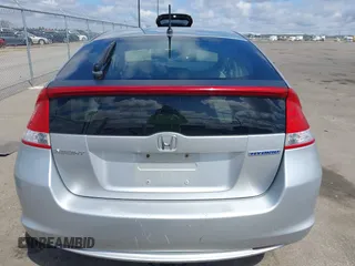 2010 Honda Insight EX with VIN JHMZE2H71AS017996, listed as a IAAI auction lot 42091356 with 142,474 mi miles and . Bid and sale history available at DreamBid. Image 16.