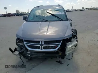 2013 Dodge Journey SE с VIN 3C4PDCAB9DT656887, выставлен на аукционе Copart как лот 54791315 с пробегом 130 394 миль миль и Списание • Salvage title. История ставок и продаж доступна на DreamBid. Изображение 14.