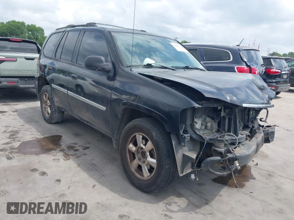 2009 GMC Envoy SLE z VIN 1GKDS33S592105035, wystawiony jako IAAI lot #42089058 z przebiegiem 249 127 mil mil oraz . Historia ofert i sprzedaży dostępna na DreamBid. Obrazek 1.